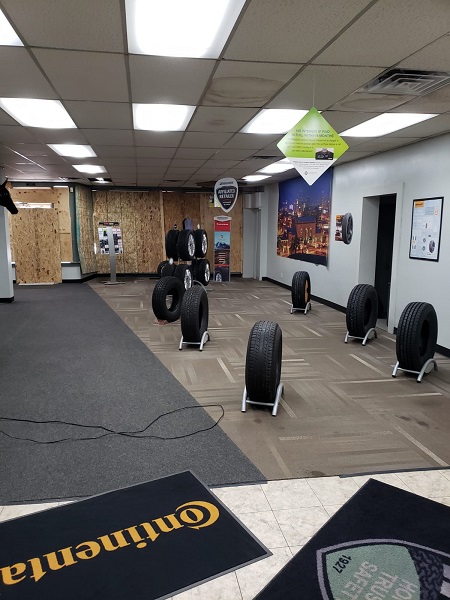 Inside Hilltop Tire Service with Boarded Windows